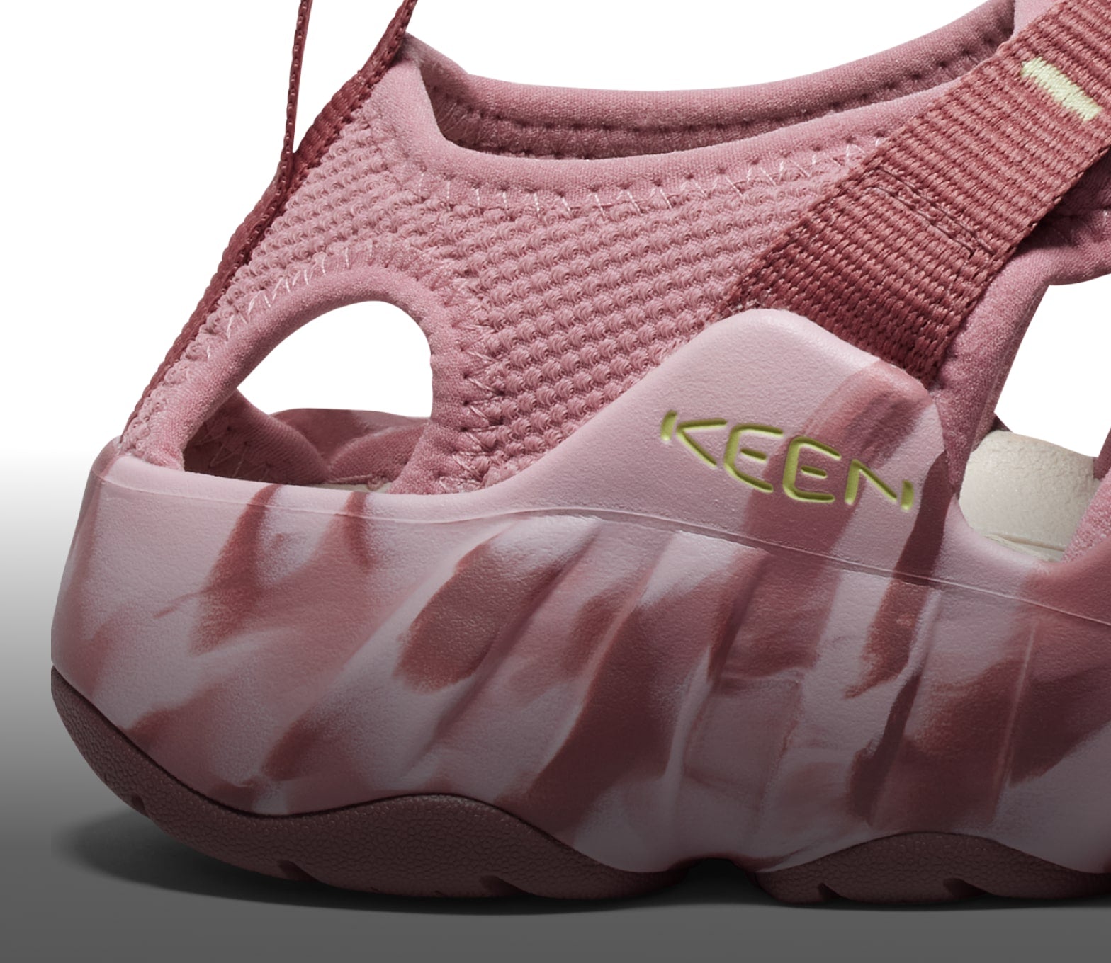 A close-up of the heel of a pink Hyperport H2 sandal.
