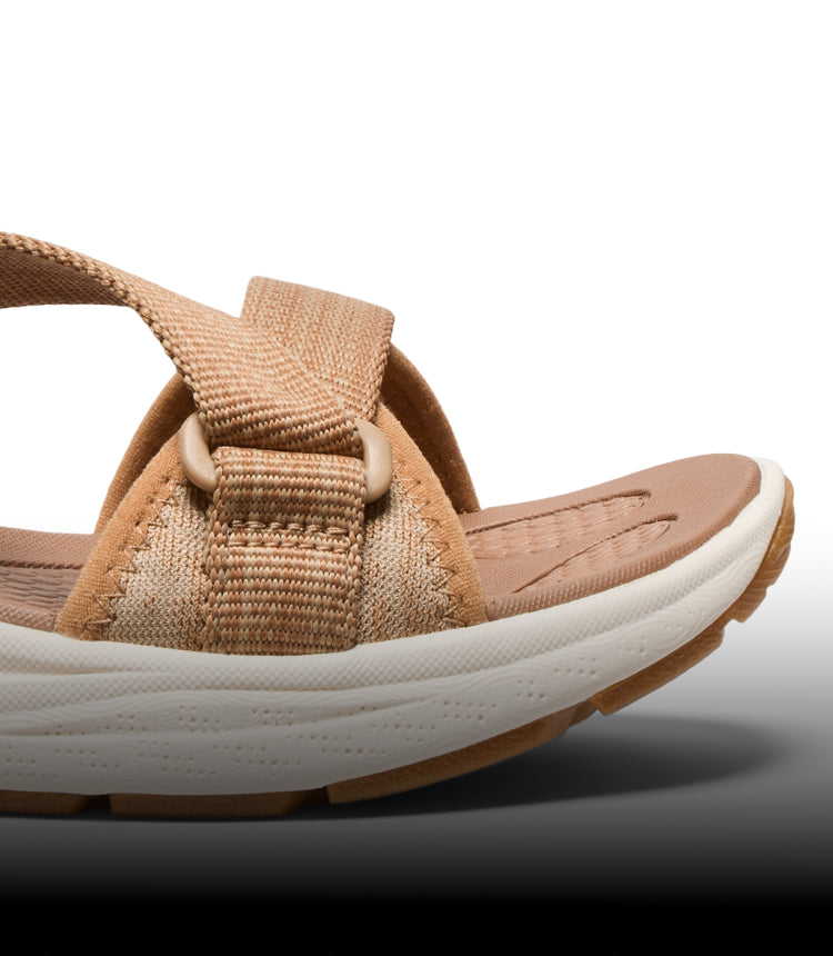 A close-up of the front strap of a KEEN sandal.