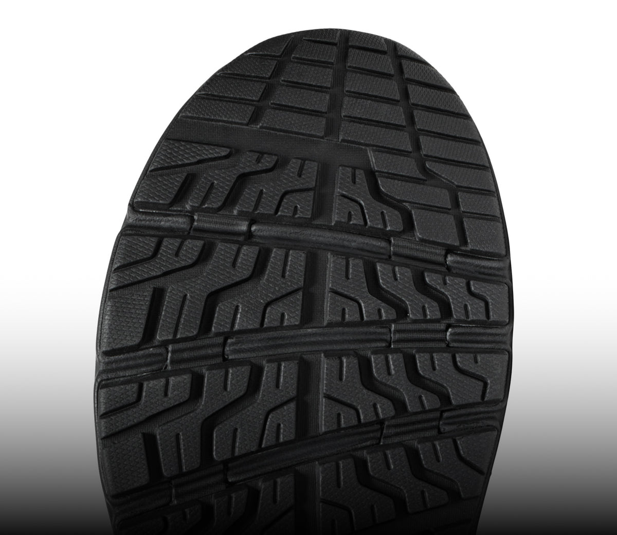 The black undersole of a KEEN work shoe.