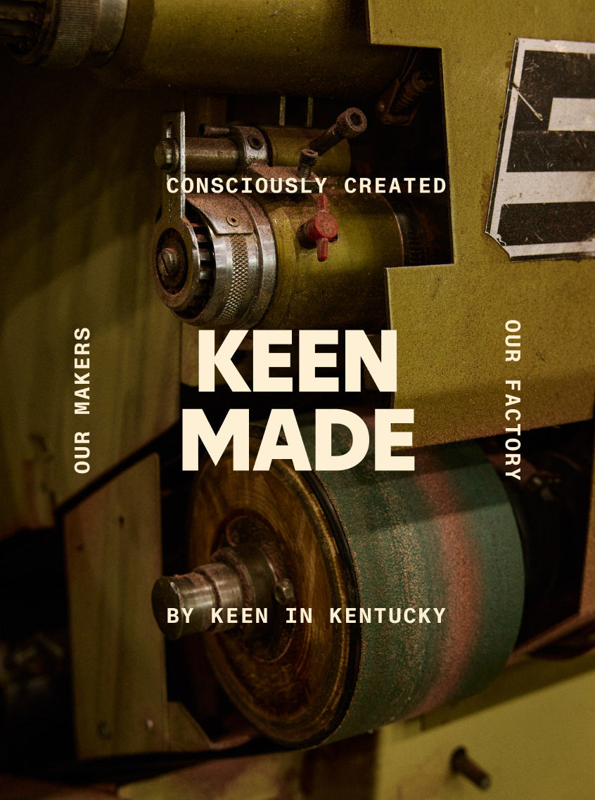 A piece of intricate factory equipment embedded with text that reads "KEEN MADE. Consciously Created. Our Makers. Our Factory. By KEEN in Kentucky."