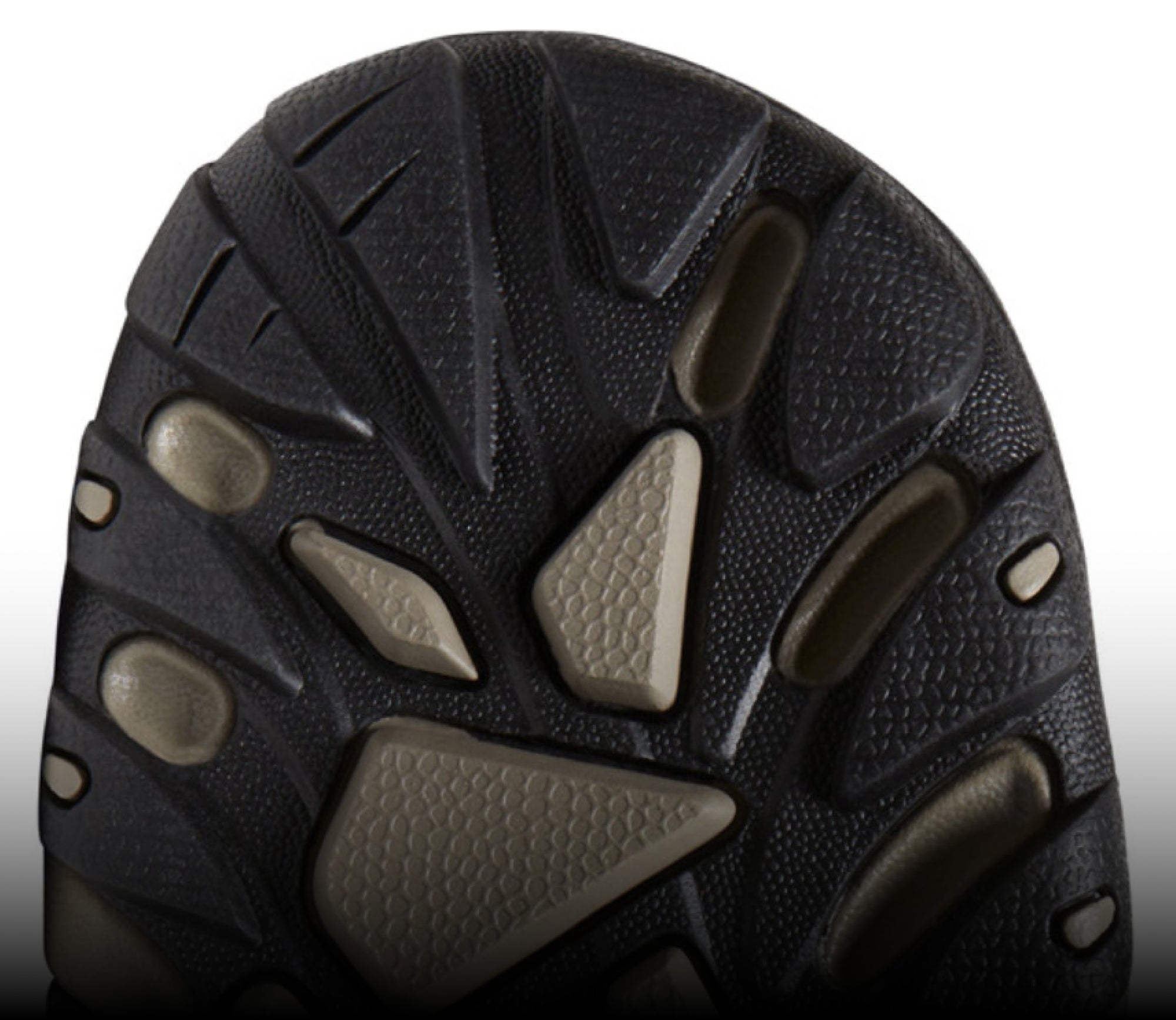 The black and taupe undersole of a KEEN Targhee shoe.