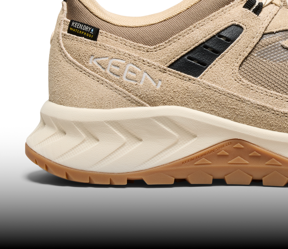 A close-up of the heel of a light brown Hightrail sneaker.