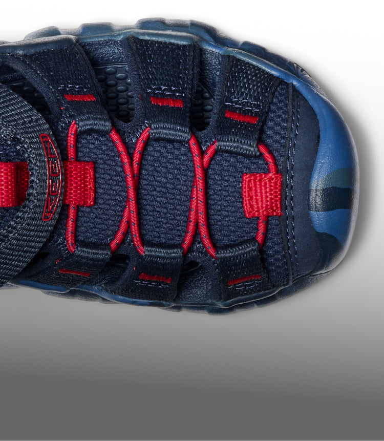 A close-up of the front/top of a dark blue Hyperport H2 sandal.