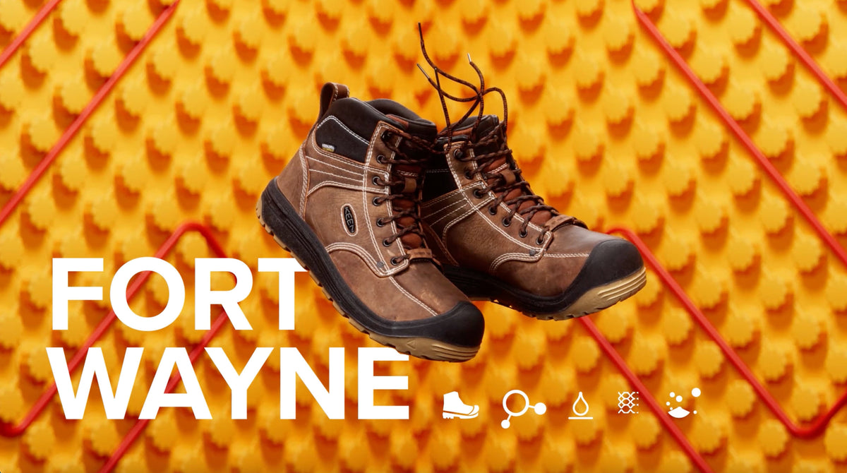 Fort Wayne work boots against yellow, textured background, video preview