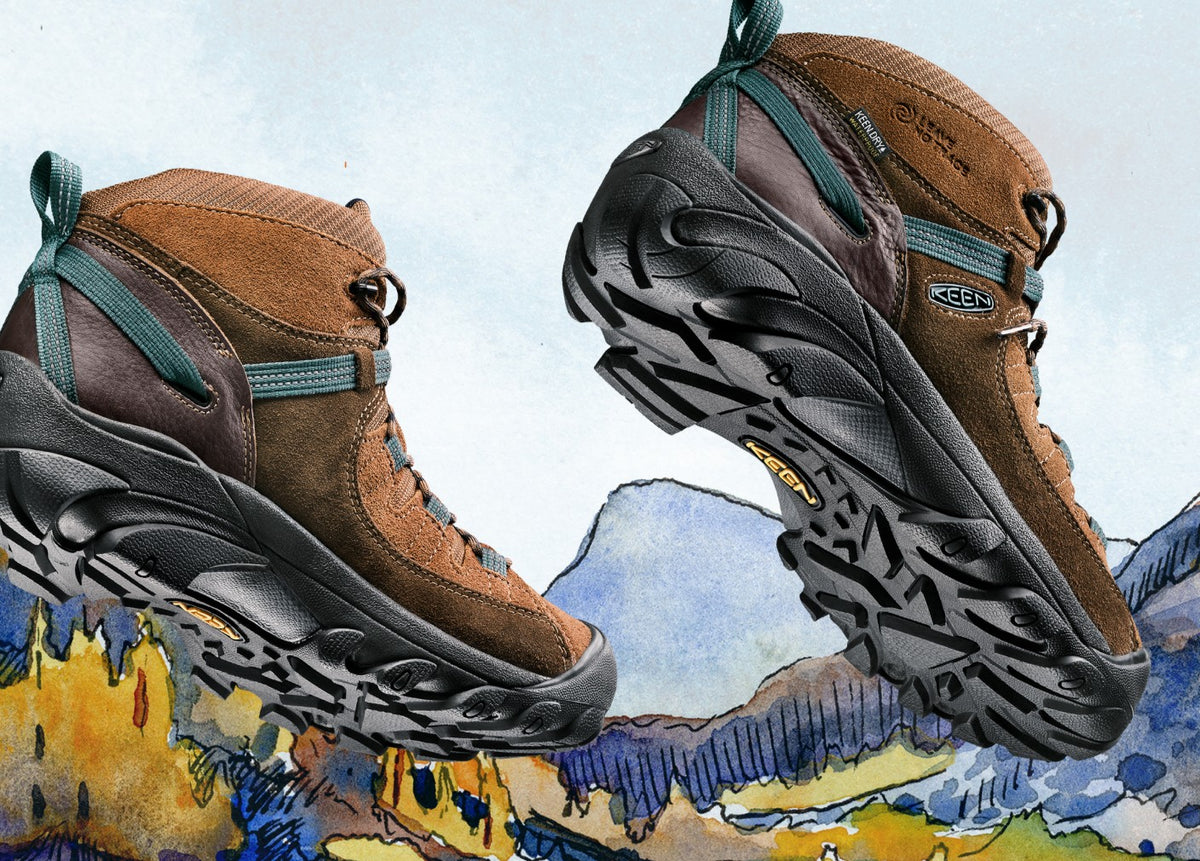 Brown KEEN Targhee IV boots with teal laces, over a watercolor painting of mountains and sky.