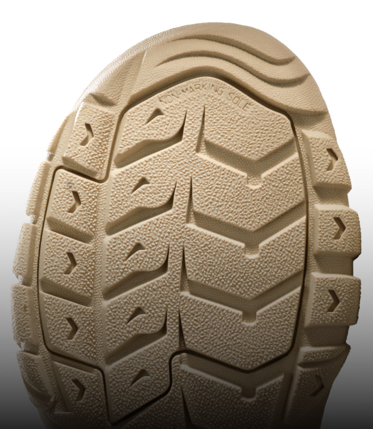 A close-up of the light-brown undersole of a KEEN Newport sandal.